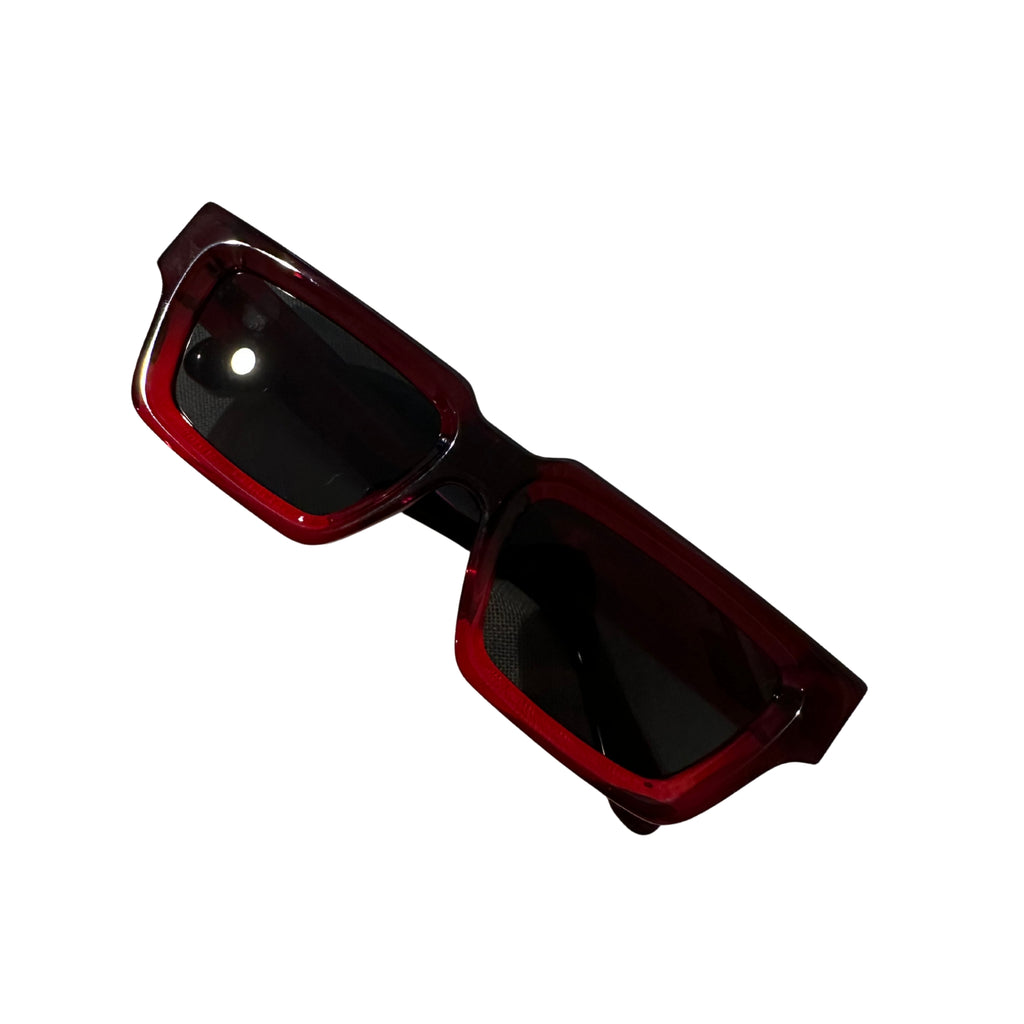 Flatlay of FAB Triton sunglasses with sporty masculine silhouette